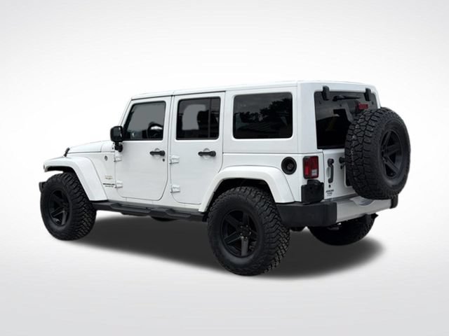 Used 2015 Jeep Wrangler Unlimited Sahara w/ Dual Top Group AWD/4WD video 3