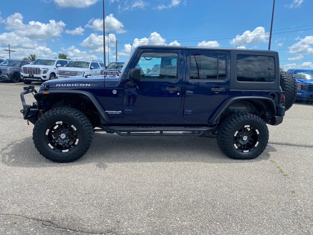 Used 2013 Jeep Wrangler Unlimited Rubicon w/ Dual Top Group AWD/4WD image 3