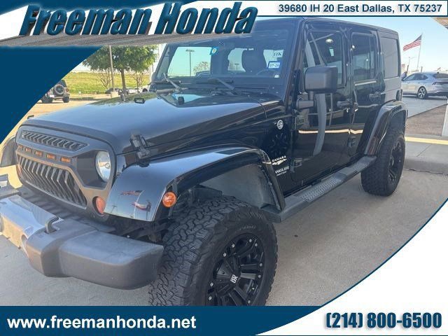 Used 2011 Jeep Wrangler Unlimited Sahara w/ Dual Top Group image 1