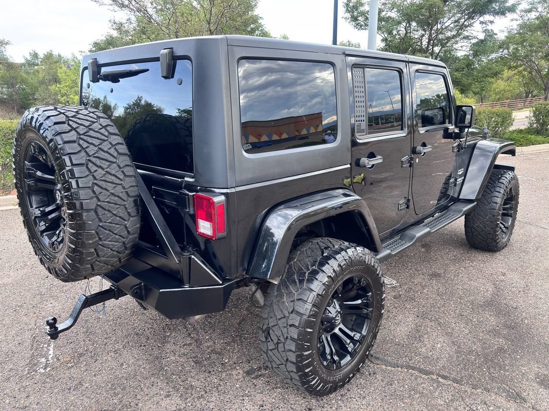 Used 2013 Jeep Wrangler Unlimited Sahara w/ Dual Top Group AWD/4WD image 8