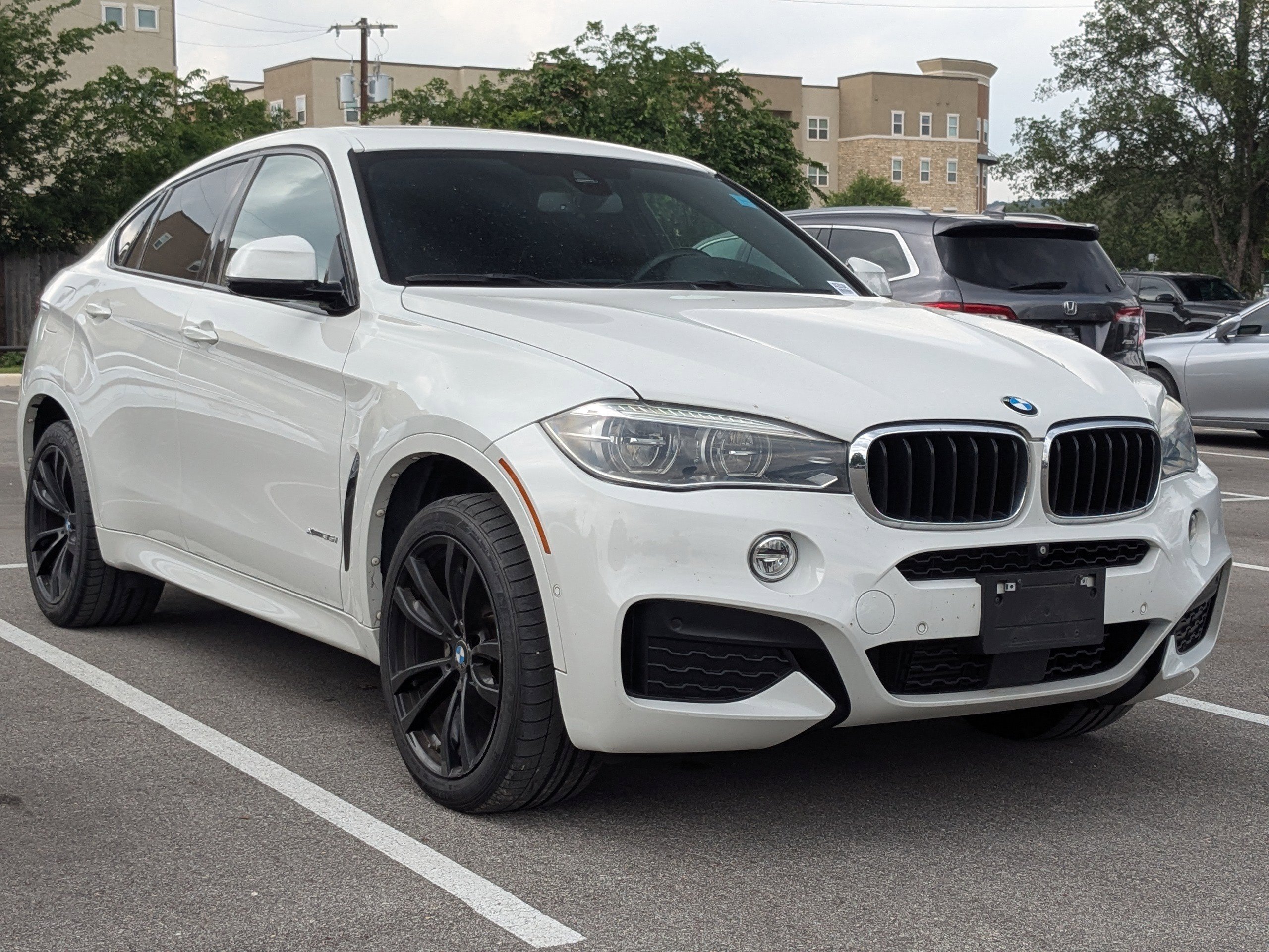 Used 2018 BMW X6 xDrive35i w/ M Sport Package AWD/4WD image 1