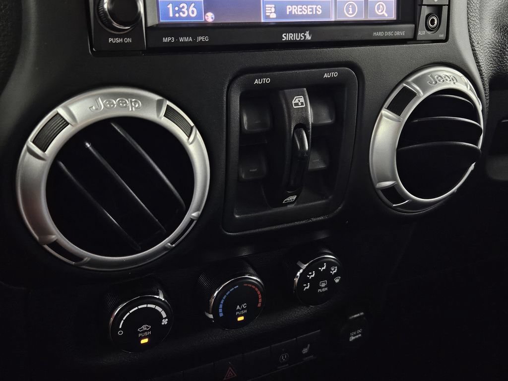Used 2015 Jeep Wrangler Unlimited Sahara w/ Dual Top Group AWD/4WD image 14