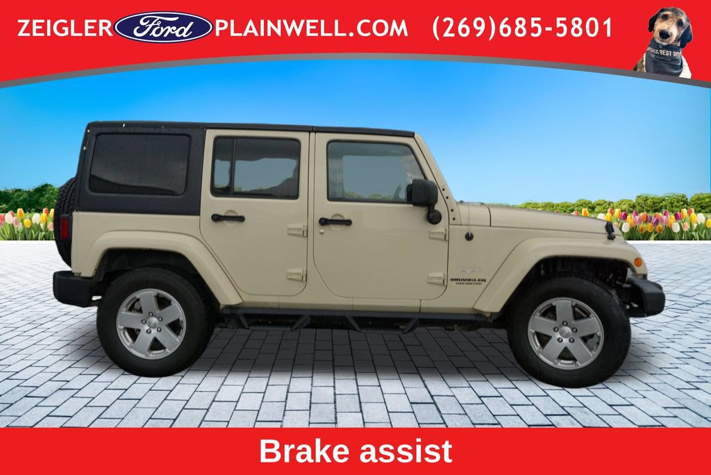 Used 2011 Jeep Wrangler Unlimited Sahara w/ Dual Top Group AWD/4WD image 6