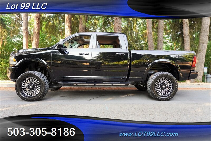 Used 2014 RAM 2500 Laramie w/ Black Appearance Group AWD/4WD image 1