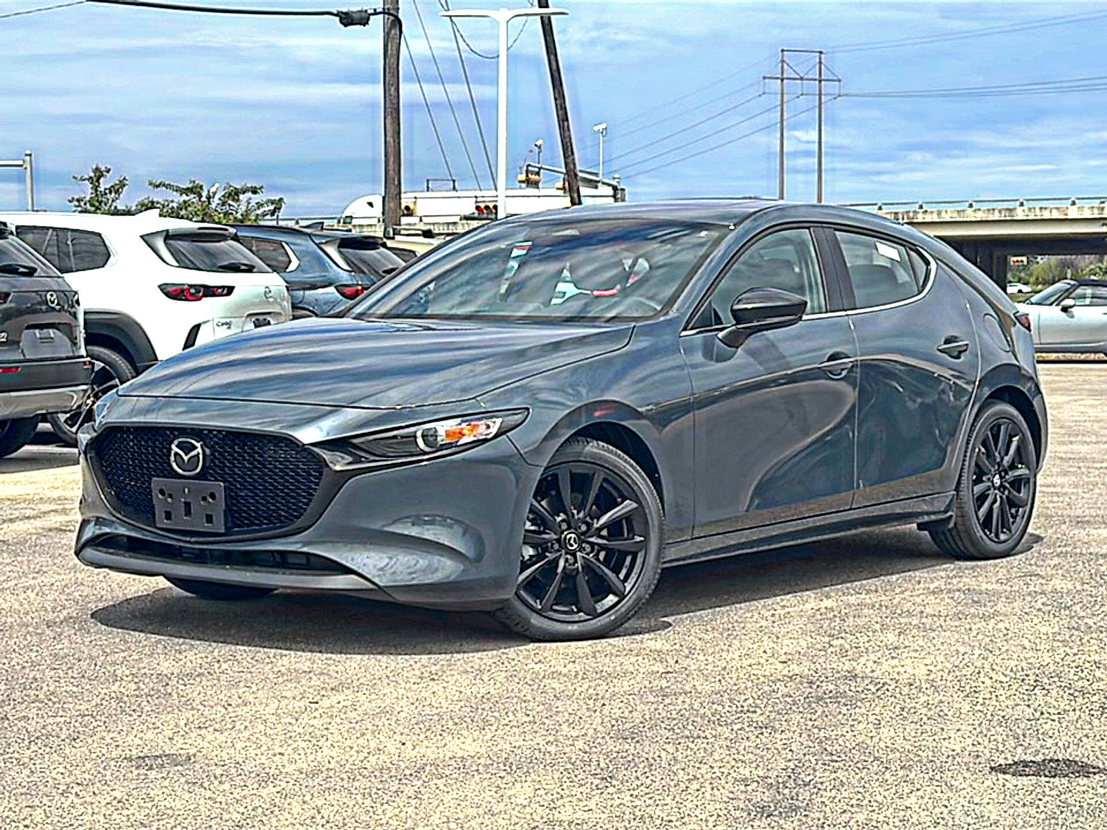 New 2025 MAZDA MAZDA3 Carbon AWD/4WD image 2
