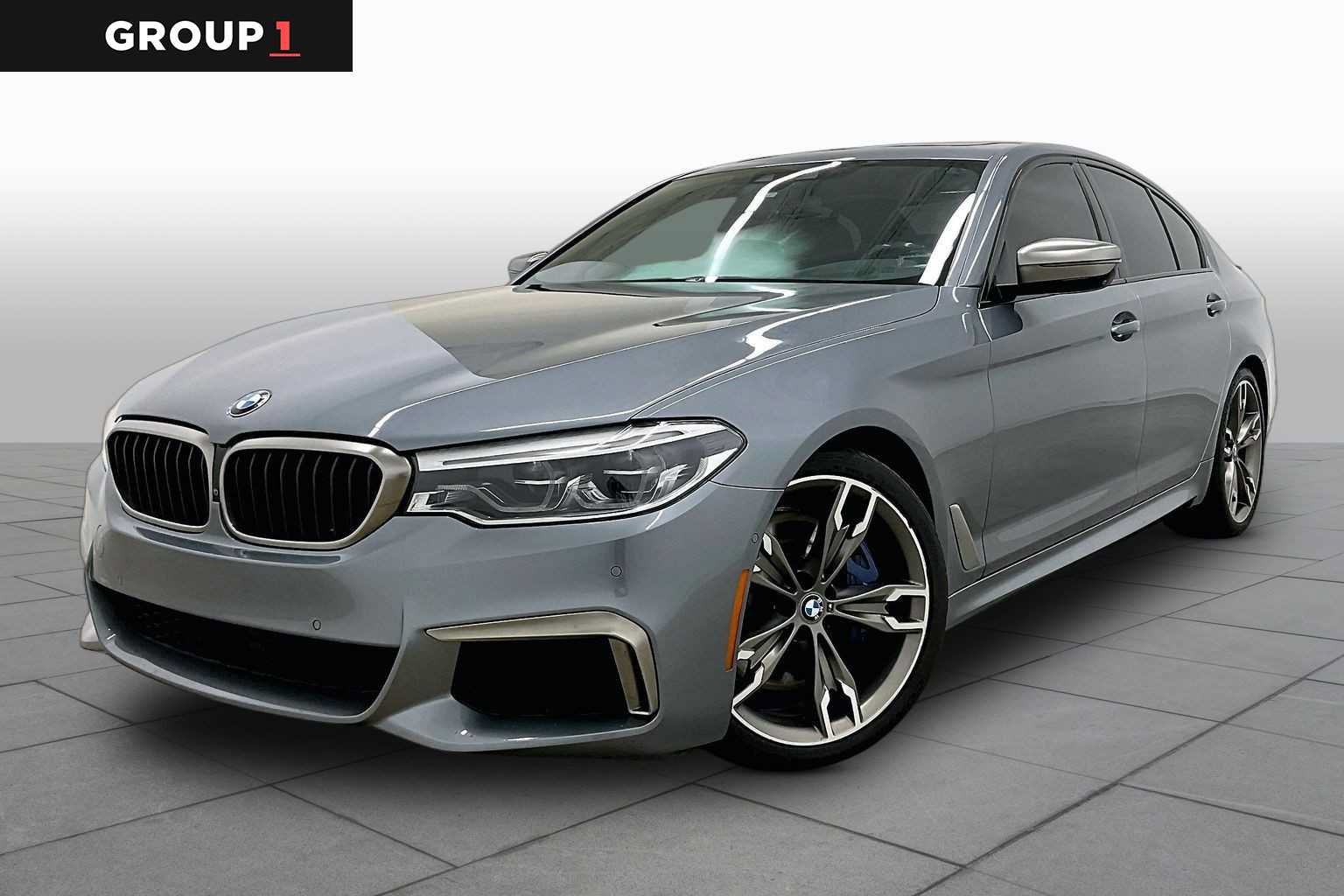 Used 2019 BMW M550i xDrive w/ Premium Package 2 AWD/4WD image 1