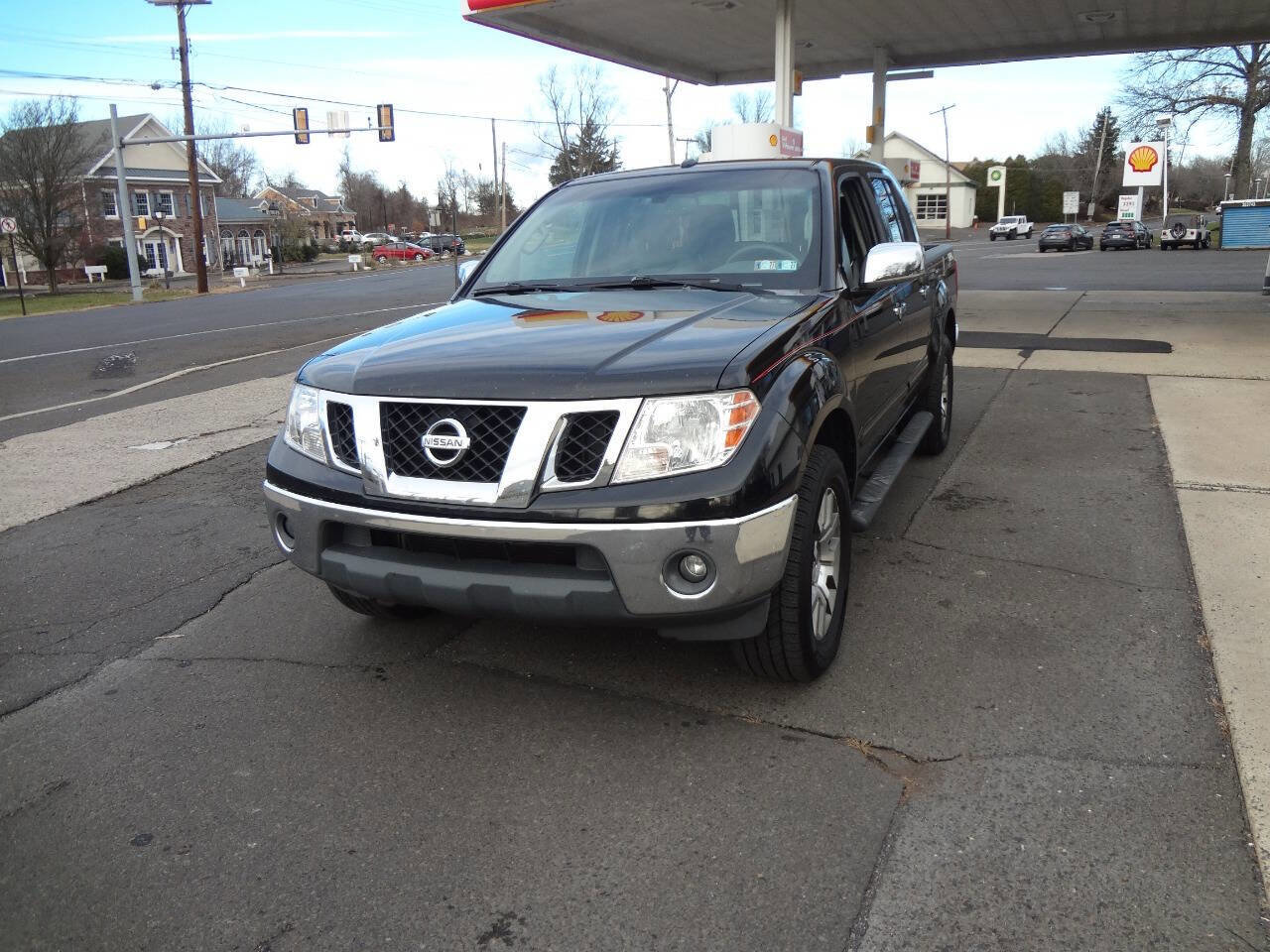 Used 2013 Nissan Frontier SL image 2