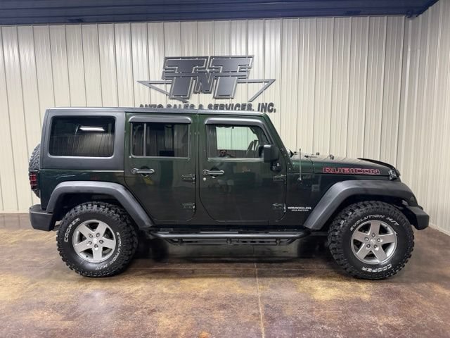 Used 2012 Jeep Wrangler Unlimited Rubicon w/ Dual Top Group AWD/4WD image 7