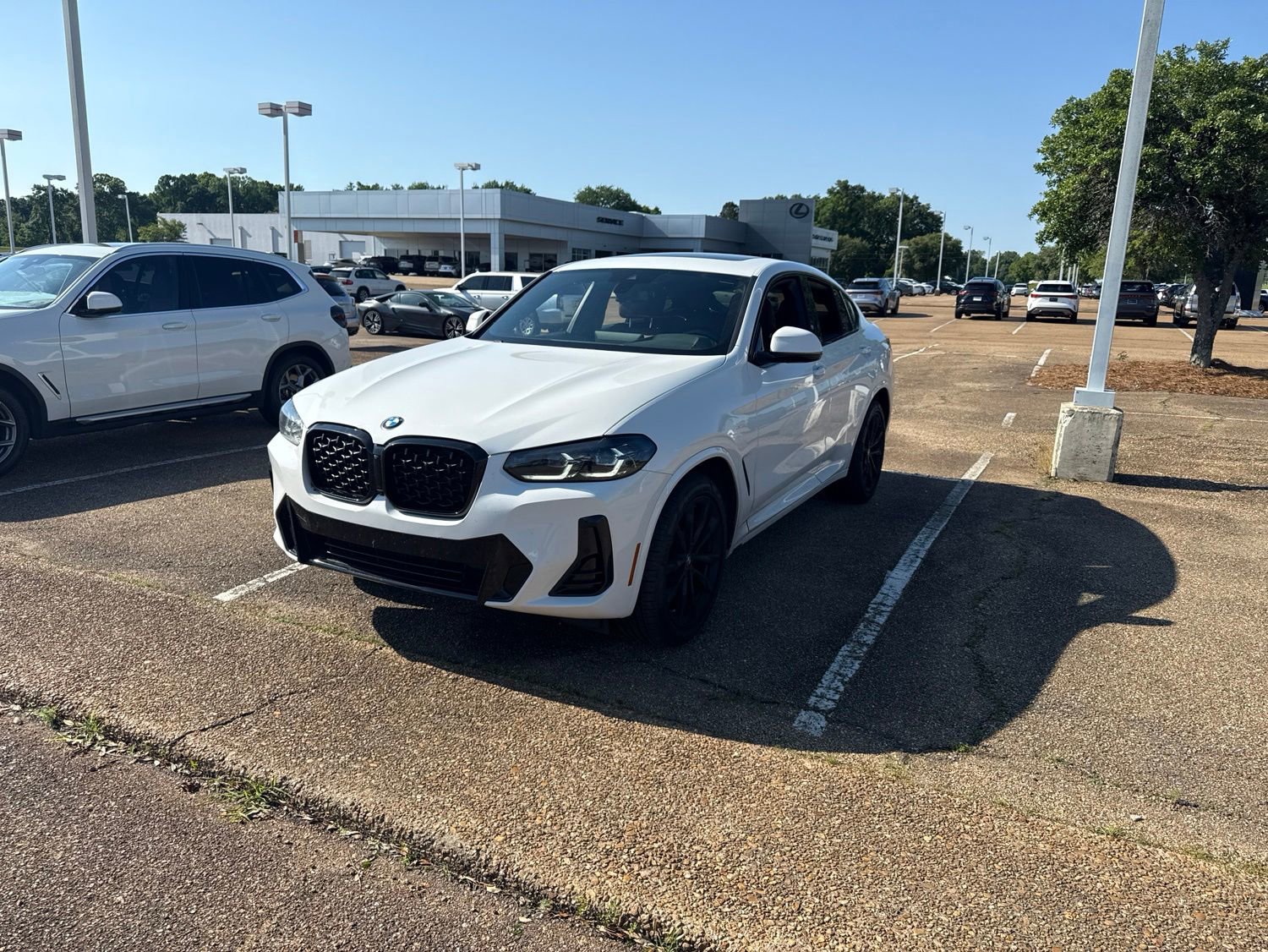 Used 2023 BMW X4 xDrive30i w/ M Sport Package AWD/4WD image 1