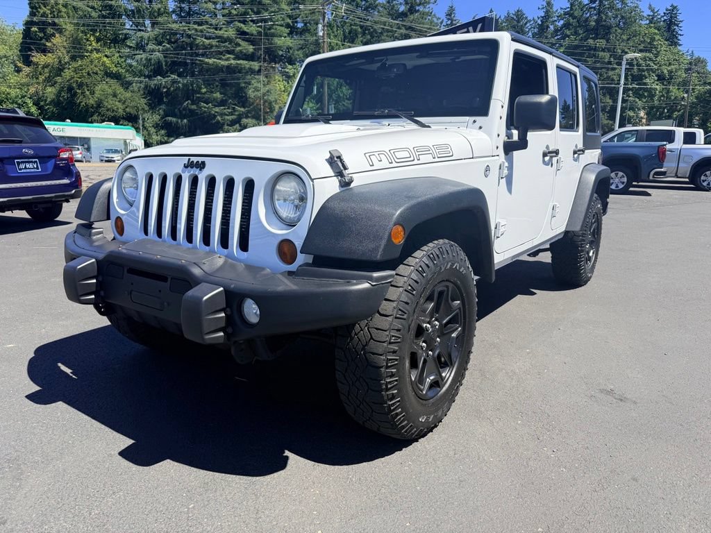 Used 2013 Jeep Wrangler Unlimited Sahara w/ Dual Top Group AWD/4WD image 1