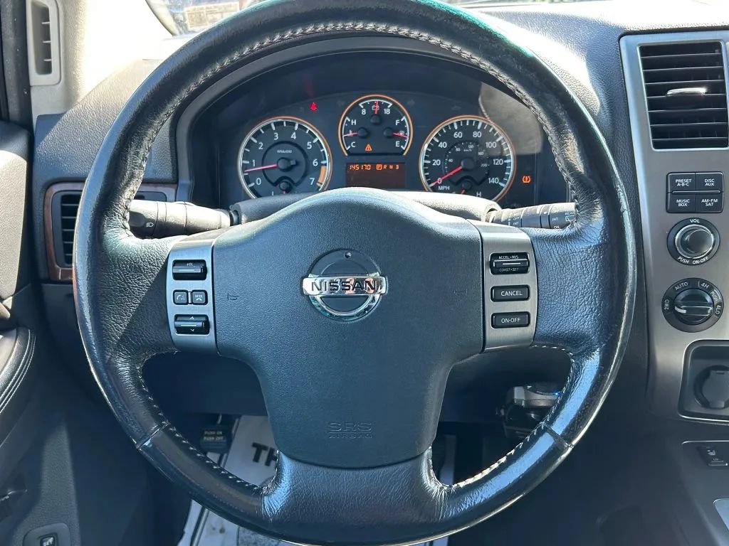 Used 2011 Nissan Armada Platinum w/ 2nd Row Captain Seat Pkg image 24