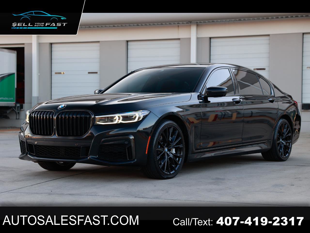 Used 2021 BMW 750i xDrive w/ Luxury Rear Seating Package image 1