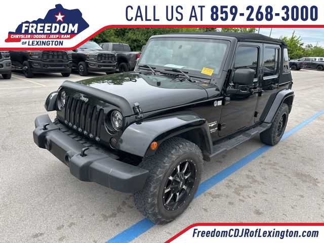 Used 2012 Jeep Wrangler Unlimited Sahara w/ Dual Top Group AWD/4WD video 1