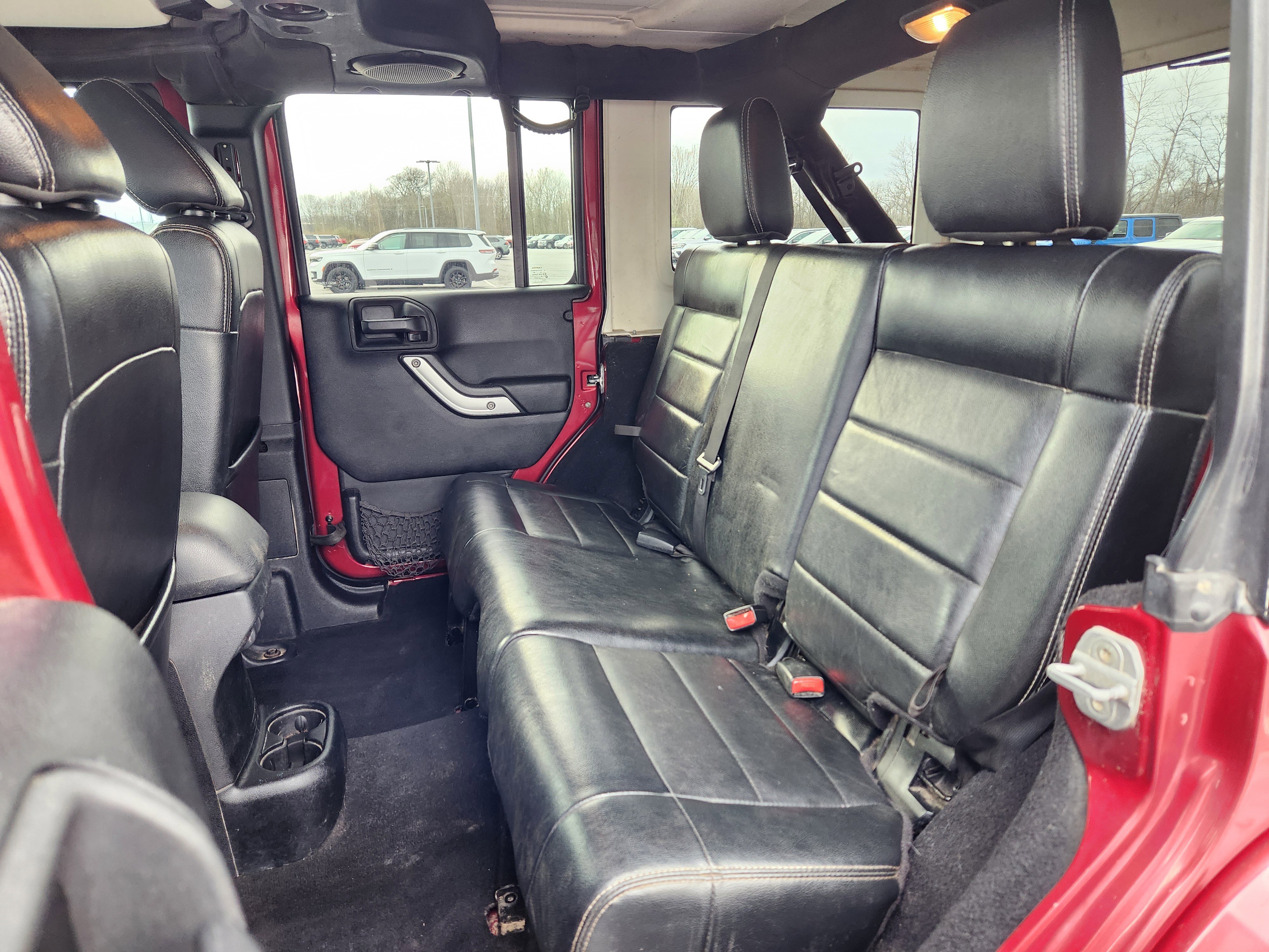 Used 2012 Jeep Wrangler Unlimited Sahara w/ Dual Top Group AWD/4WD image 11