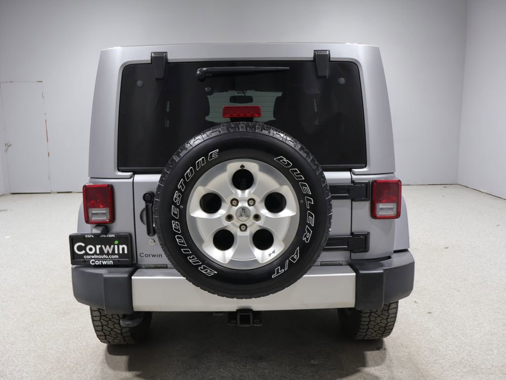 Used 2015 Jeep Wrangler Unlimited Sahara w/ Trailer Tow Group AWD/4WD video 3