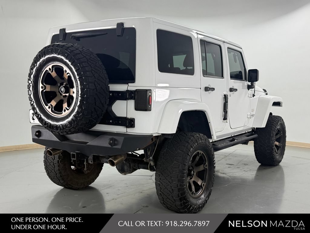 Used 2014 Jeep Wrangler Unlimited Sahara w/ Mopar Chrome Edition Group AWD/4WD image 6