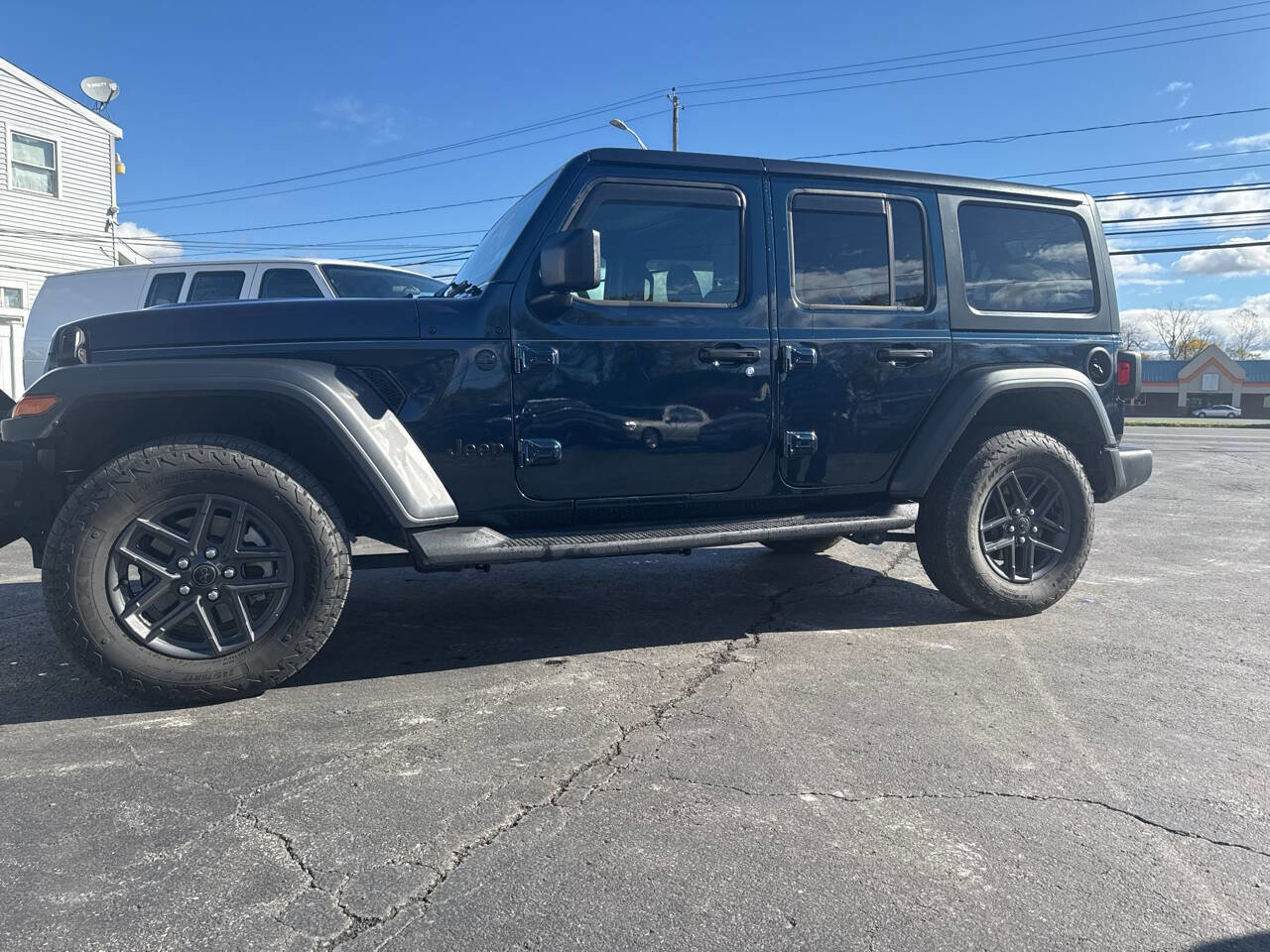 Used 2025 Jeep Wrangler Unlimited Sport image 1