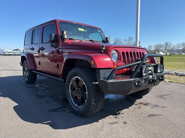 Used 2012 Jeep Wrangler Unlimited Sahara AWD/4WD image 1
