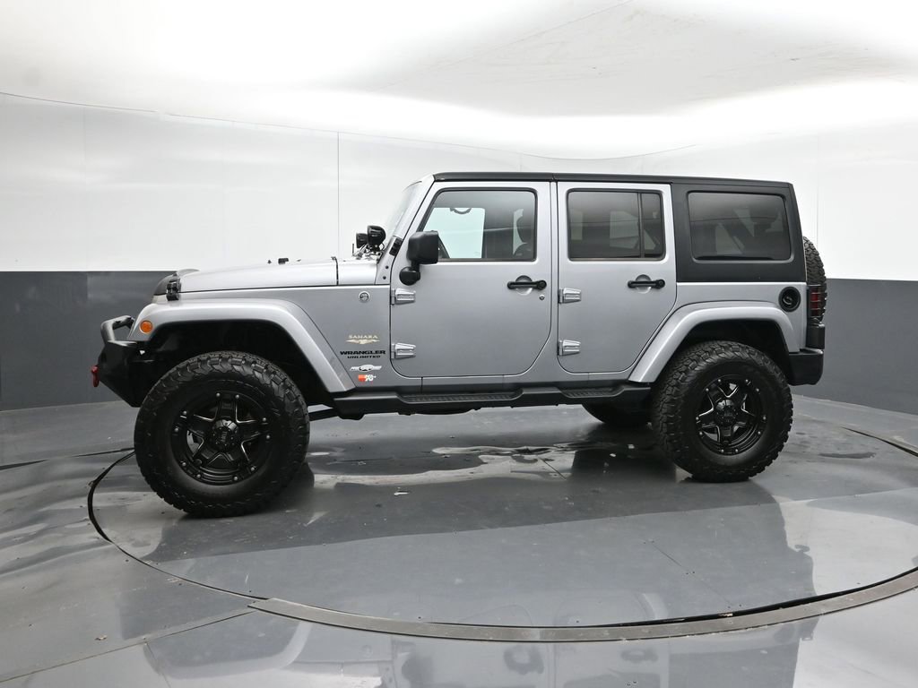 Used 2013 Jeep Wrangler Unlimited Sahara w/ Dual Top Group image 2