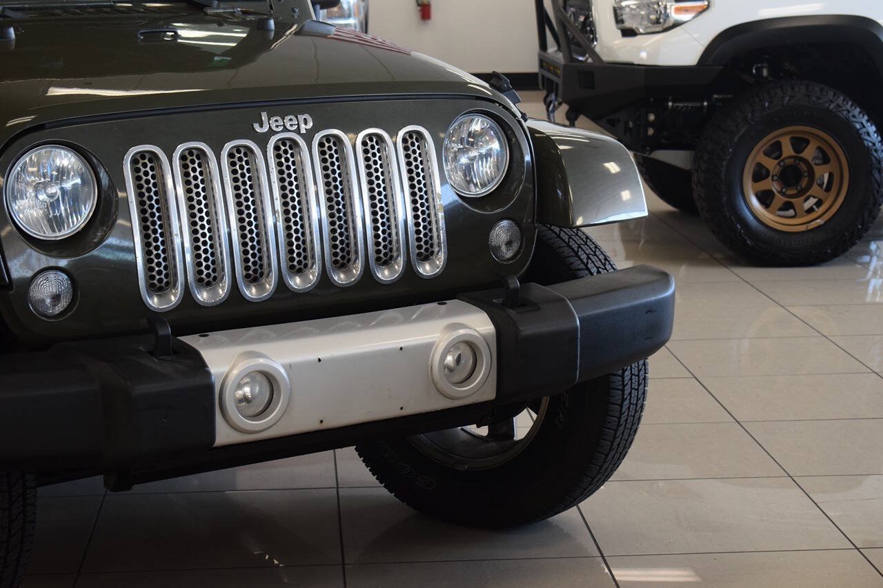 Used 2015 Jeep Wrangler Unlimited Sahara w/ Dual Top Group AWD/4WD image 11