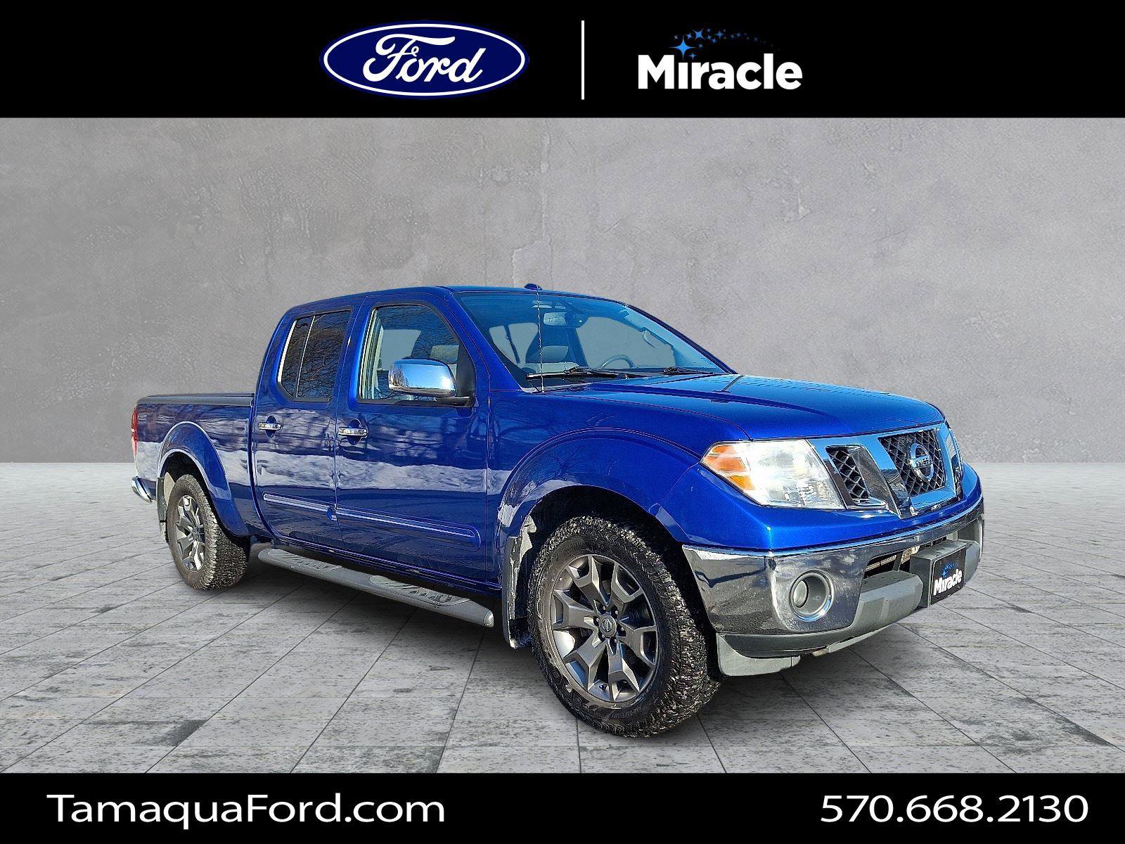 Used 2014 Nissan Frontier SL w/ SL Moonroof Package image 1