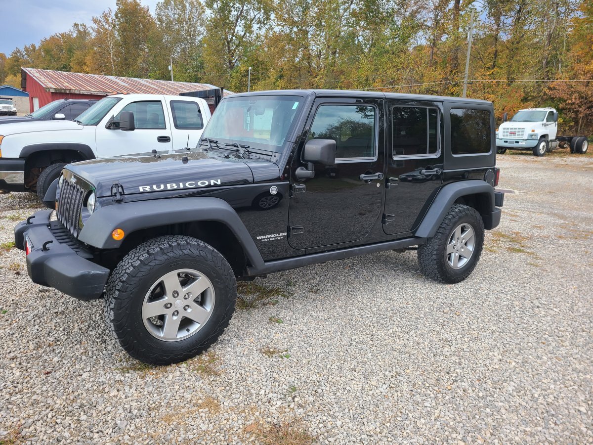 Used 2012 Jeep Wrangler Unlimited Rubicon w/ Dual Top Group