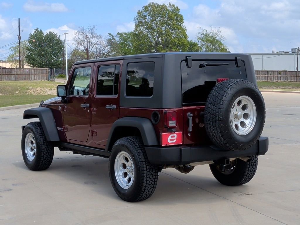 Used 2010 Jeep Wrangler Unlimited Rubicon w/ Dual Top Group image 6