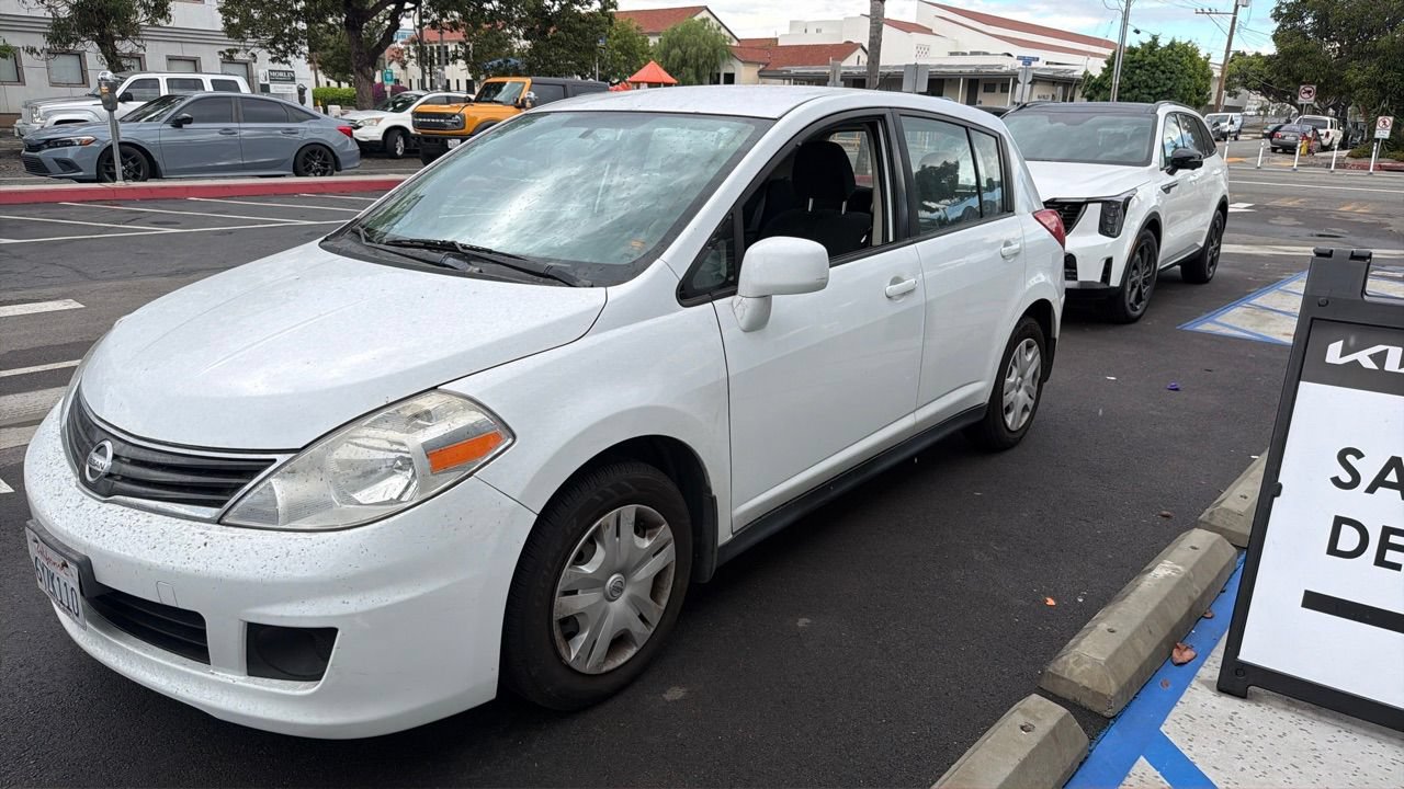 Used 2012 Nissan Versa 1.8 S w/ Plus Pkg FWD image 1