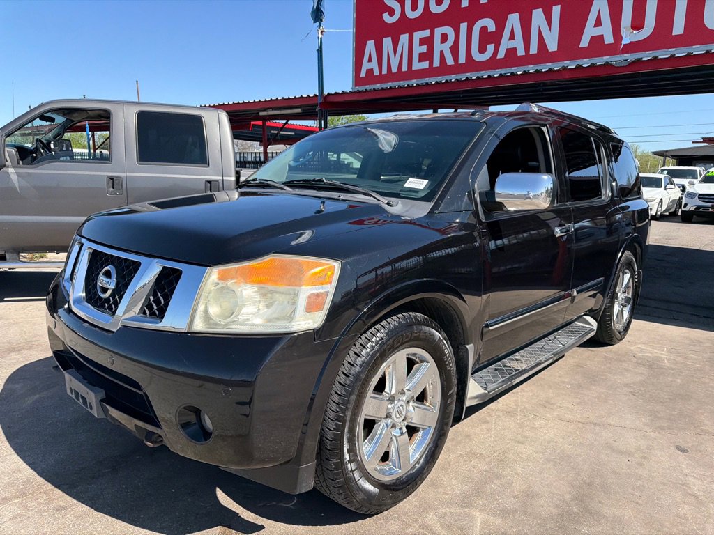 Used 2011 Nissan Armada Platinum w/ 2nd Row Captain Seat Pkg image 2