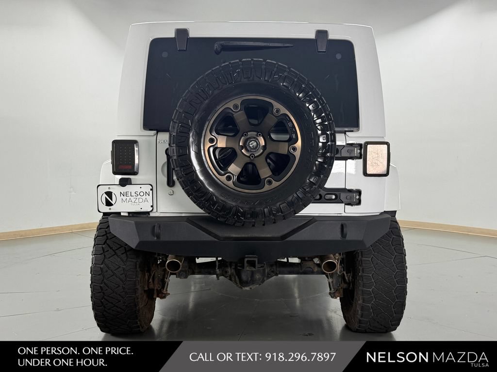 Used 2014 Jeep Wrangler Unlimited Sahara w/ Mopar Chrome Edition Group AWD/4WD image 7