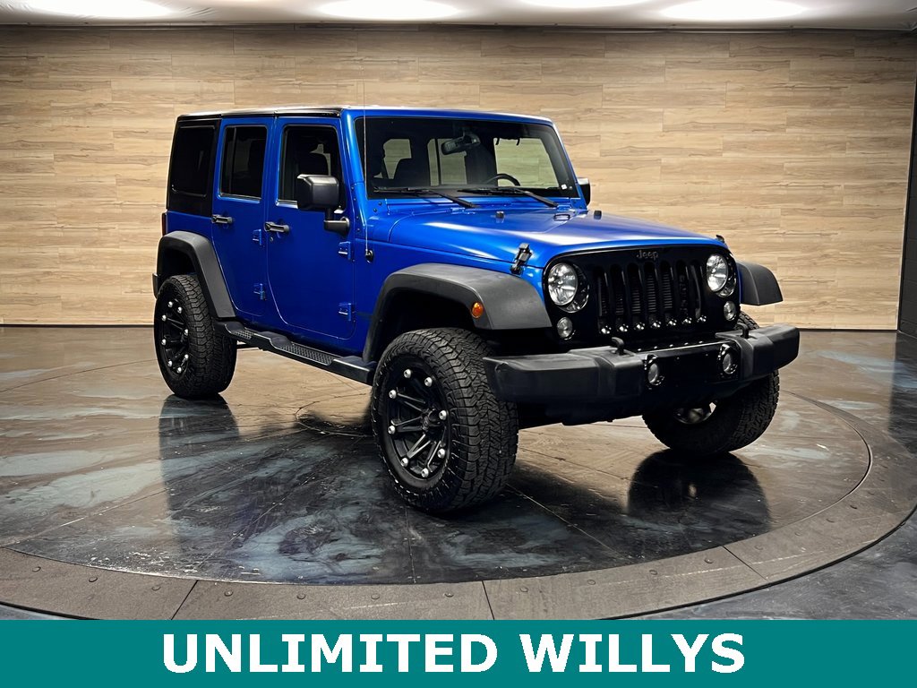 Used 2016 Jeep Wrangler Unlimited Sport image 1