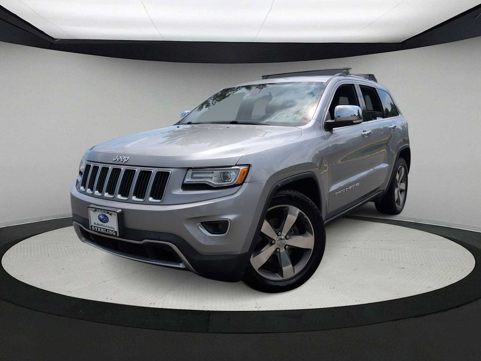 Used 2015 Jeep Grand Cherokee Limited w/ Luxury Group II AWD/4WD image 1