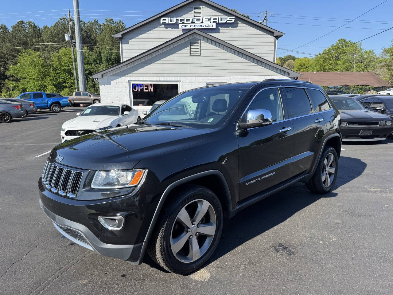 Used 2014 Jeep Grand Cherokee Limited AWD/4WD image 1