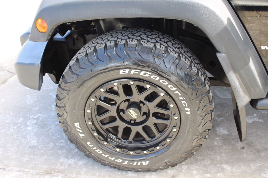 Used 2015 Jeep Wrangler Unlimited Sport w/ Mopar Black Appearance Group image 12