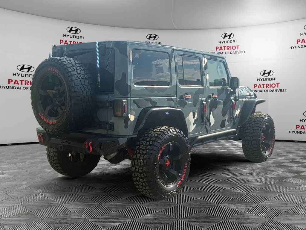 Used 2014 Jeep Wrangler Unlimited Sahara w/ Connectivity Group AWD/4WD image 3