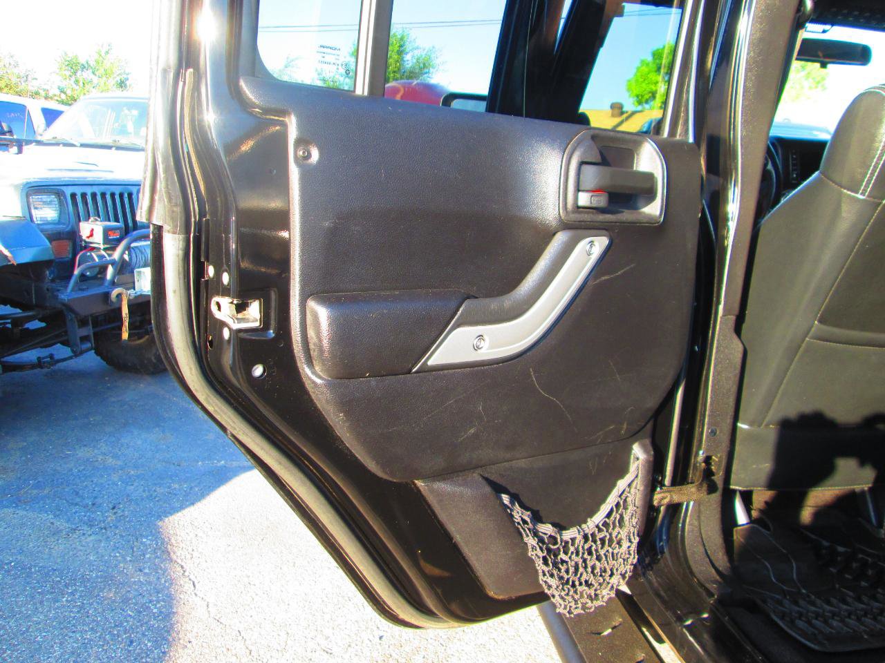 Used 2012 Jeep Wrangler Unlimited Rubicon w/ Dual Top Group AWD/4WD image 11