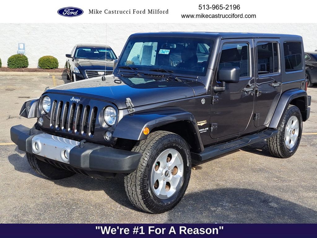 Used 2014 Jeep Wrangler Unlimited Sahara w/ Dual Top Group image 1