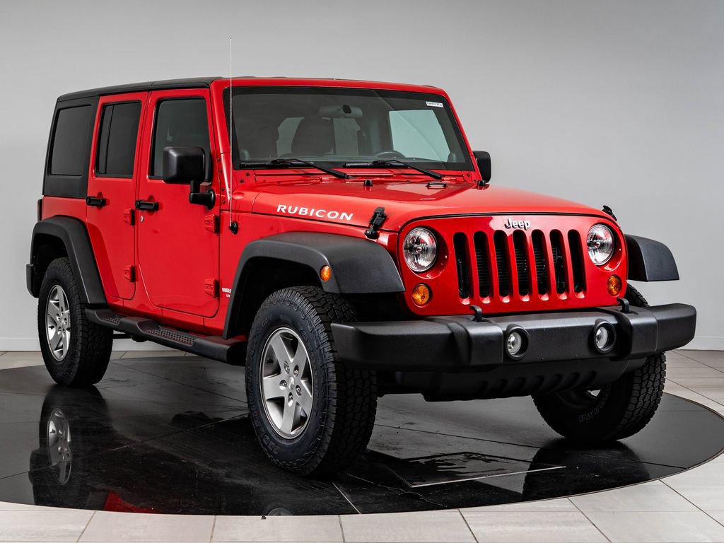 Used 2012 Jeep Wrangler Unlimited Rubicon w/ Dual Top Group AWD/4WD image 12