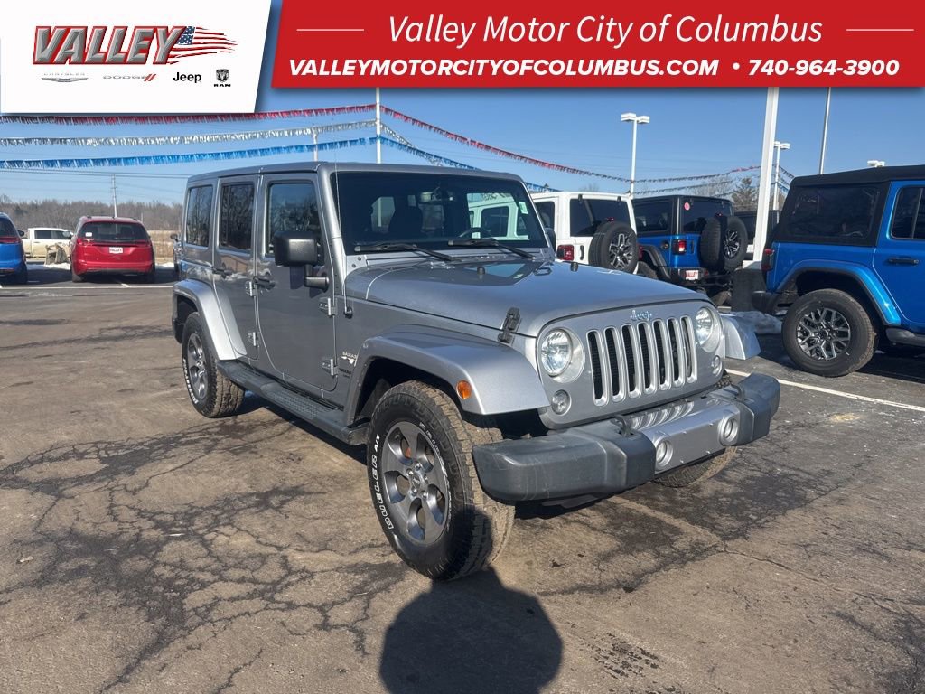 Used 2016 Jeep Wrangler Unlimited Sahara image 1
