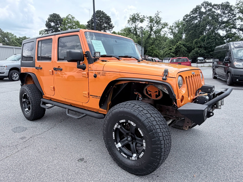 Used 2012 Jeep Wrangler Unlimited Sport AWD/4WD image 2