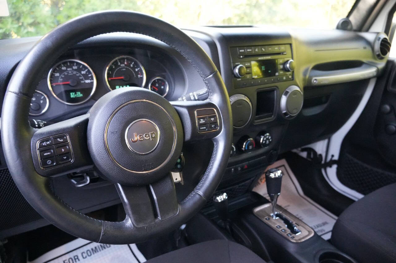 Used 2014 Jeep Wrangler Unlimited Sport w/ Mopar Black Appearance Group AWD/4WD image 13