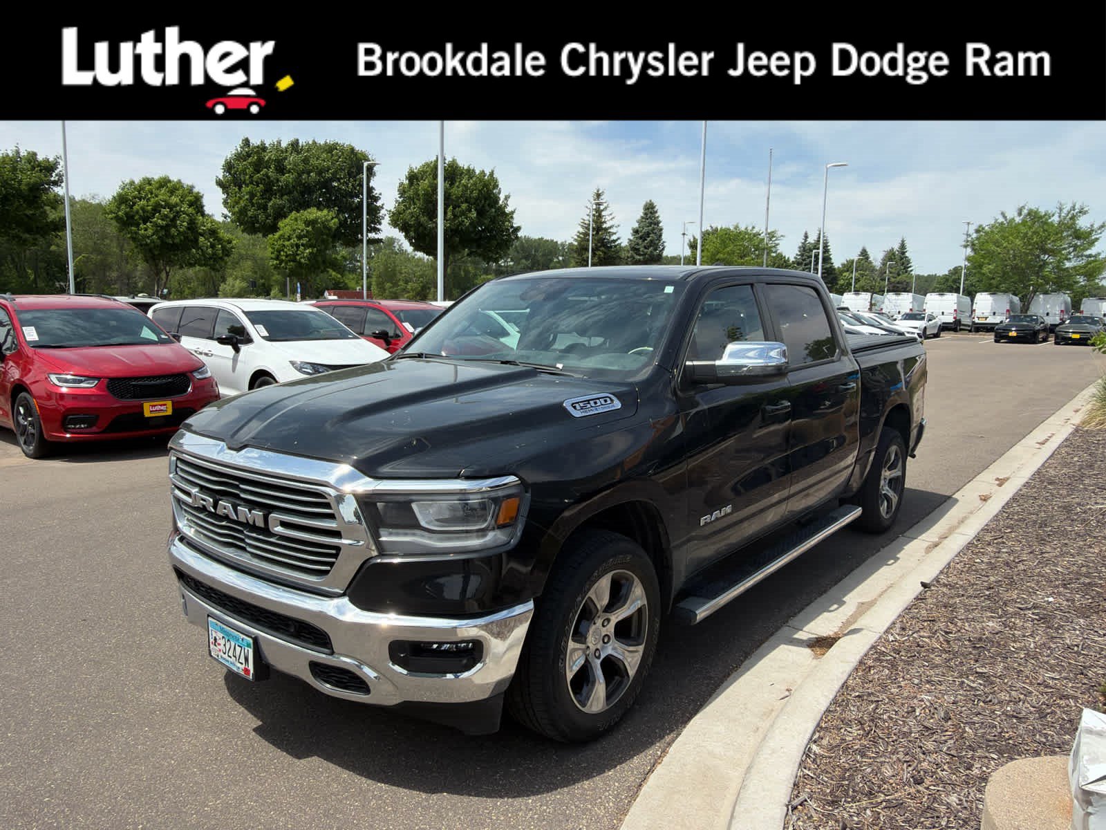 Used 2023 RAM 1500 Laramie AWD/4WD image 1