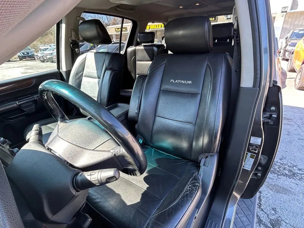 Used 2011 Nissan Armada Platinum w/ 2nd Row Captain Seat Pkg image 2
