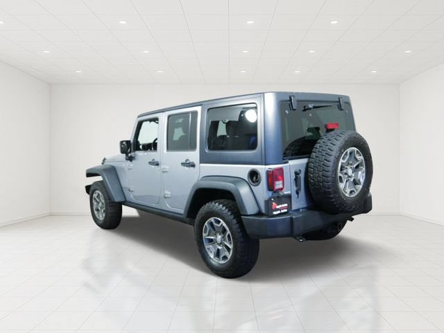 Used 2014 Jeep Wrangler Unlimited Rubicon w/ Dual Top Group AWD/4WD image 4