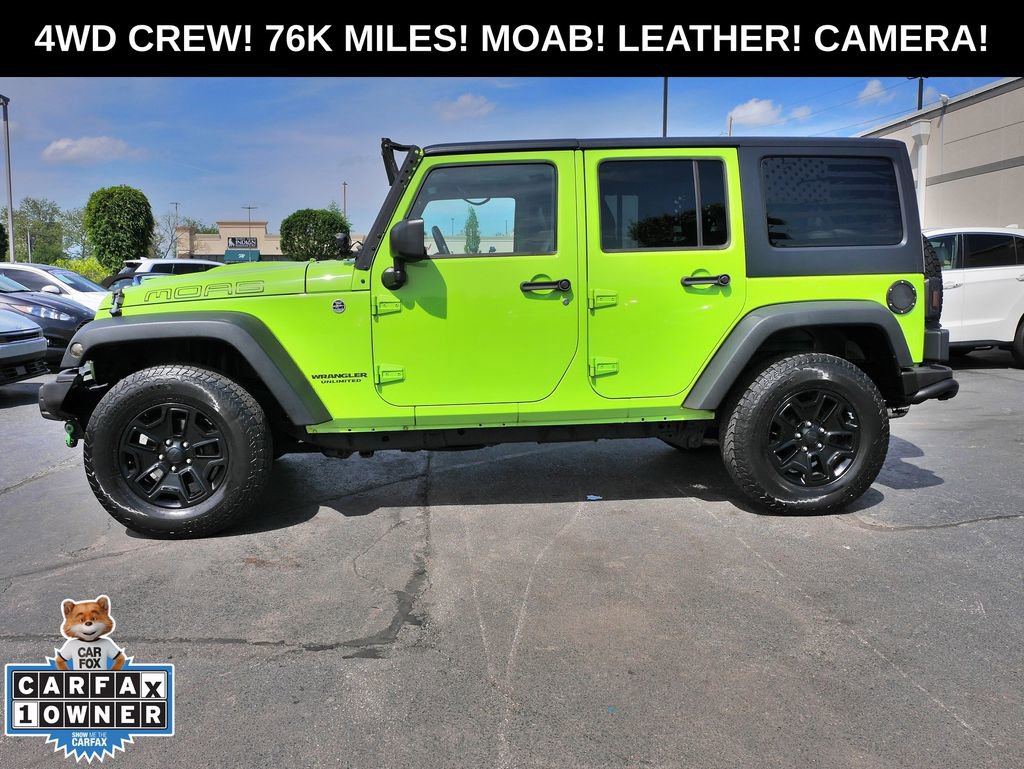 Used 2013 Jeep Wrangler Unlimited Sahara AWD/4WD image 1