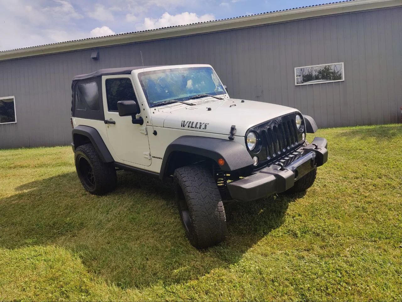 Used 2015 Jeep Wrangler Sport image 1