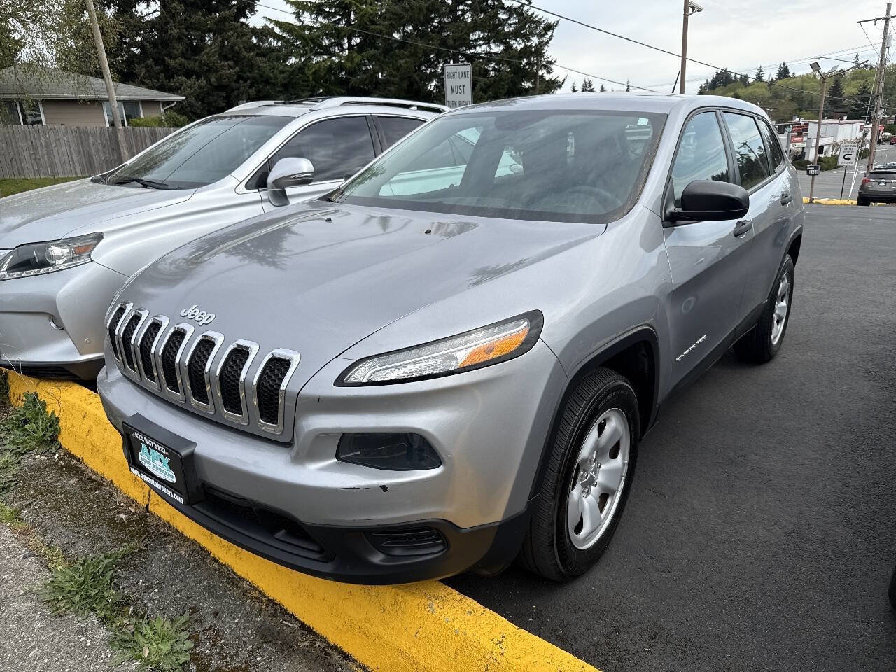 Used 2014 Jeep Cherokee Sport AWD/4WD image 1