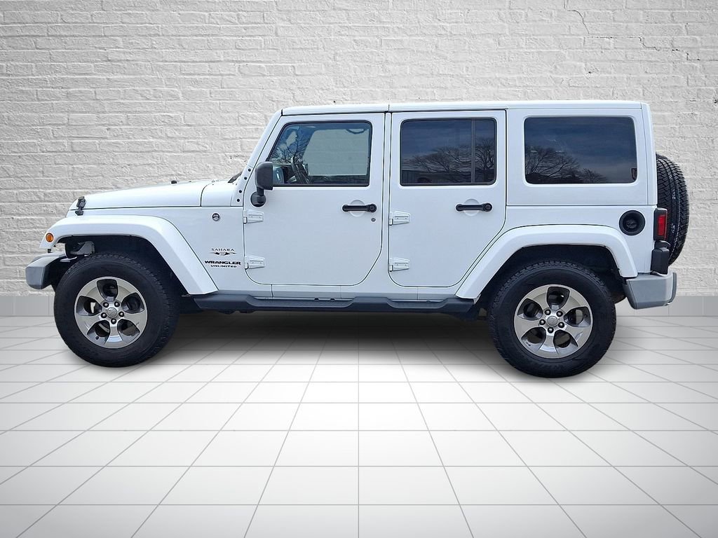 Used 2017 Jeep Wrangler Unlimited Sahara w/ Dual Top Group AWD/4WD image 7