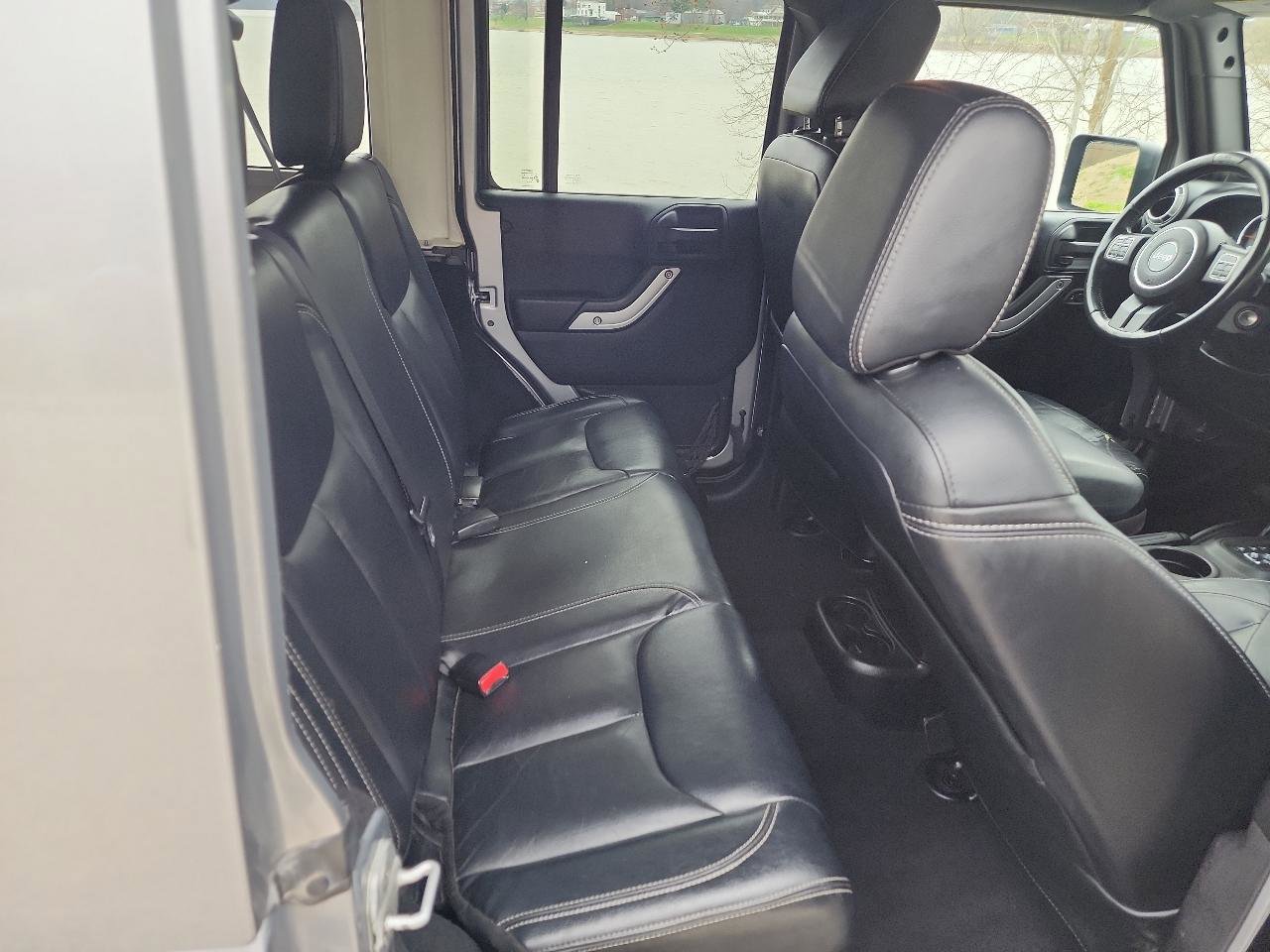 Used 2013 Jeep Wrangler Unlimited Sahara w/ Dual Top Group AWD/4WD image 12