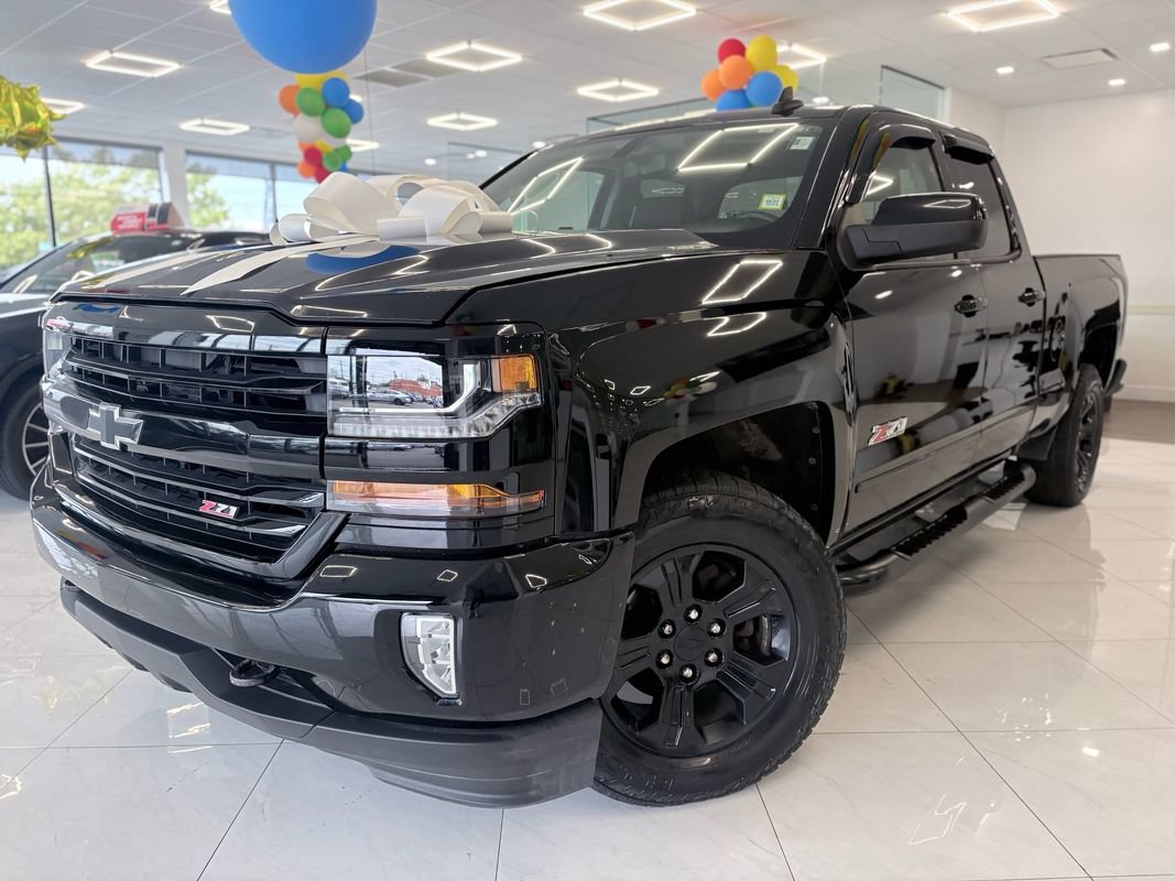 Used 2017 Chevrolet Silverado 1500 LT w/ Midnight Edition AWD/4WD image 1